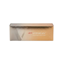 Vitaran HCP foundation complex cream box in a metallic gold and silver gradient color, shown on a clean white background.