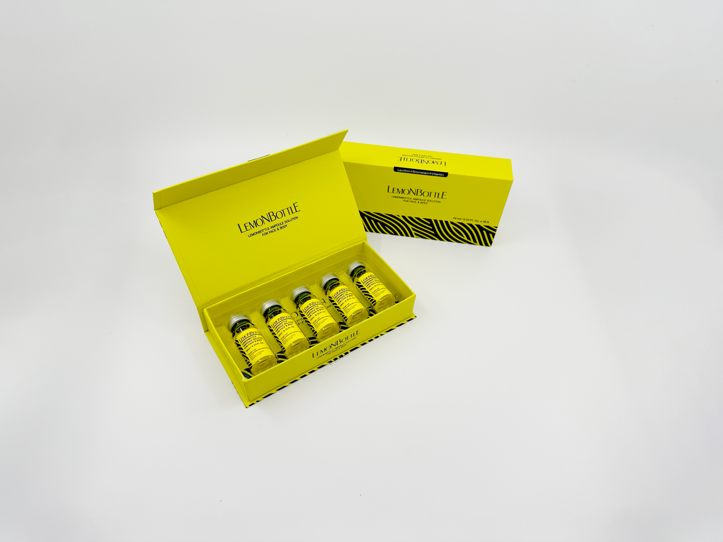 Yellow box with skincare bottles on a white background