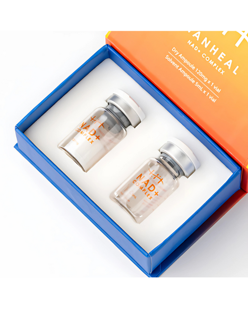 Two small glass bottles with white caps in a blue and orange box.